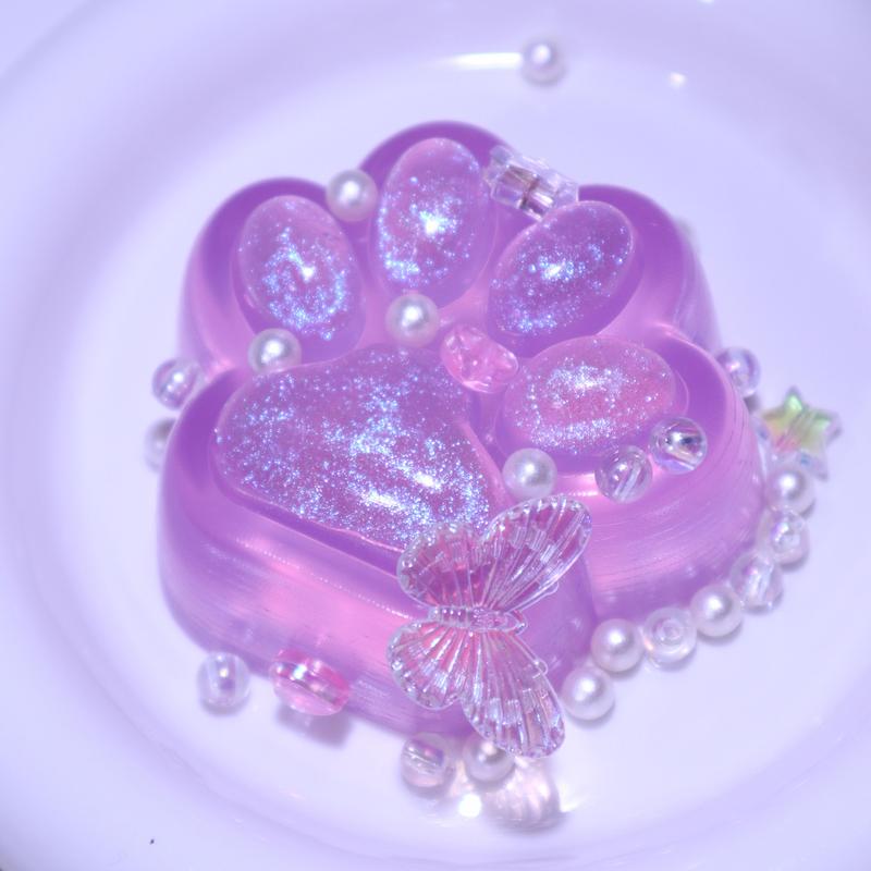 shimmering purple paw squishy toy – stress relief with a touch of elegance