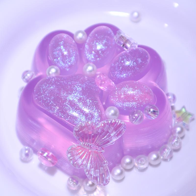 shimmering purple paw squishy toy – stress relief with a touch of elegance