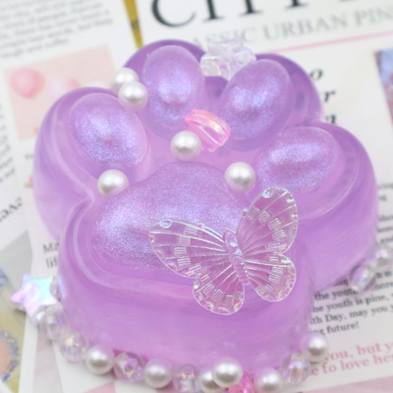 shimmering purple paw squishy toy – stress relief with a touch of elegance