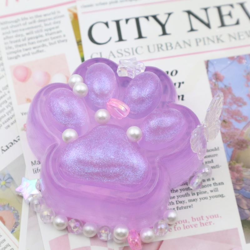 shimmering purple paw squishy toy – stress relief with a touch of elegance