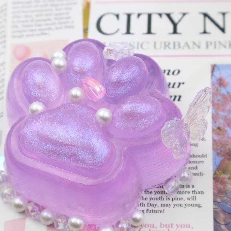 shimmering purple paw squishy toy – stress relief with a touch of elegance