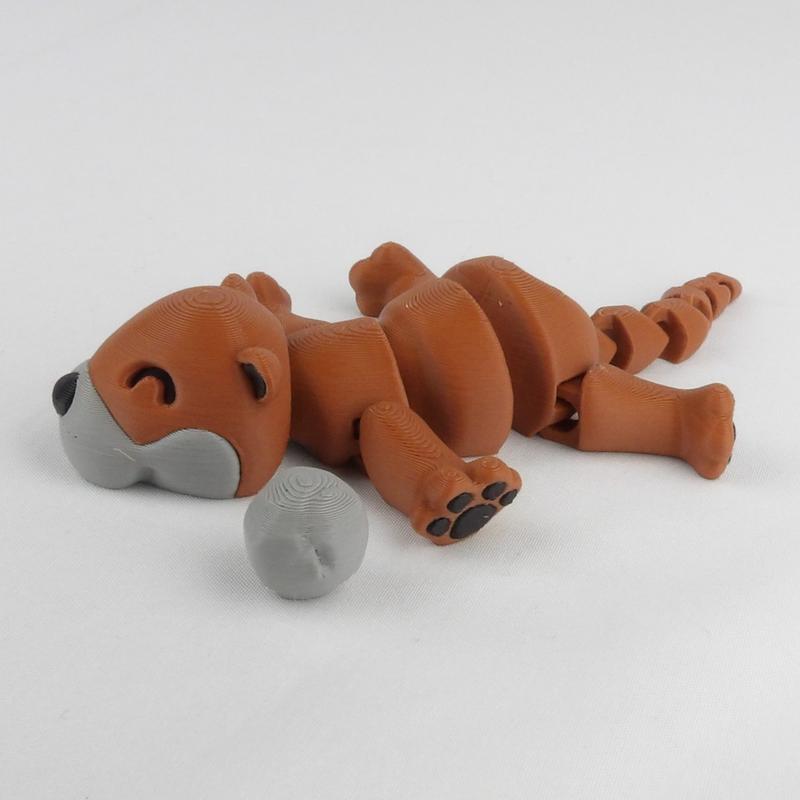 Colorful Articulated Otter Desk Buddy - 3D Printed Fidget Toy for Stress Relief!