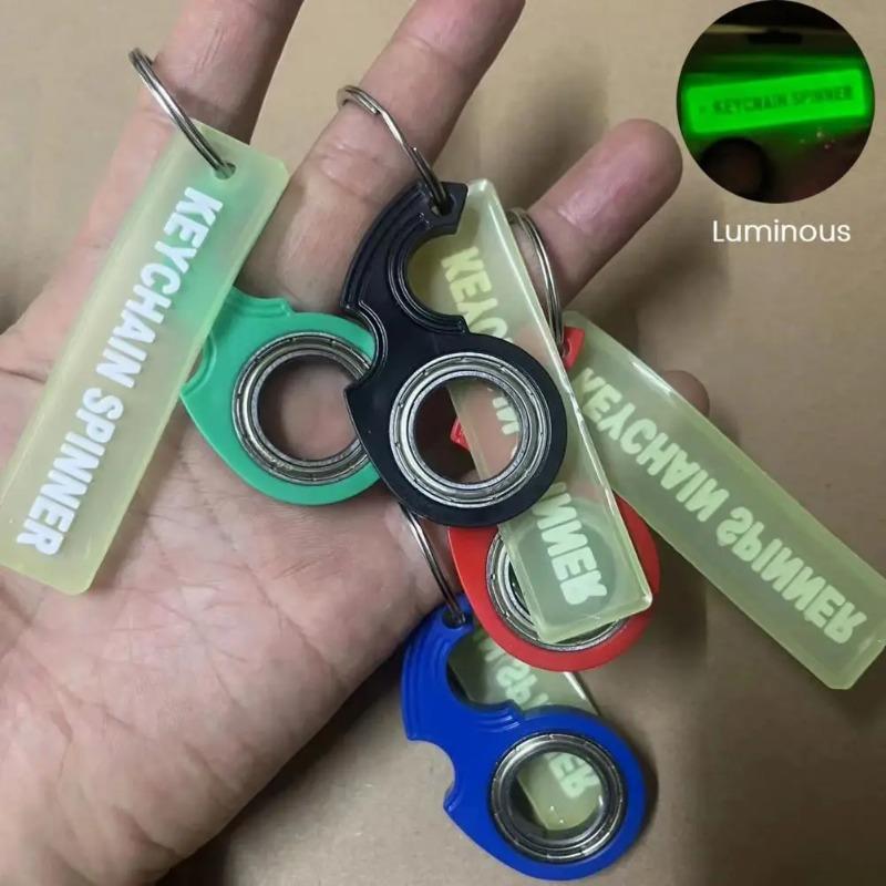 Fingertip Rotating Keychain Anti-Stress Toy: Decompression Keychain with Red, Black, Blue, And Green Options - Adult Sensing Toy for Stress Relief